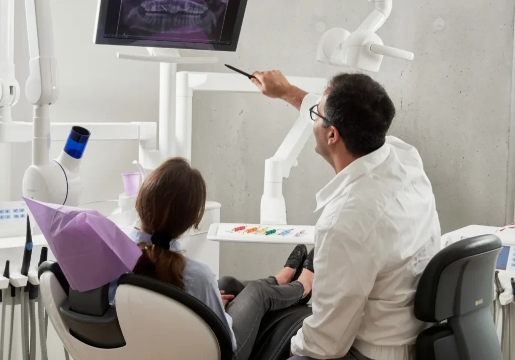 Dr. M and Dr. G were partners at a two-location general dentistry practice in Charleston, West Virginia. https://unsplash.com/photos/man-in-white-dress-shirt-holding-black-pen--m-4tYmtLlI?utm_content=creditShareLink&utm_medium=referral&utm_source=unsplash